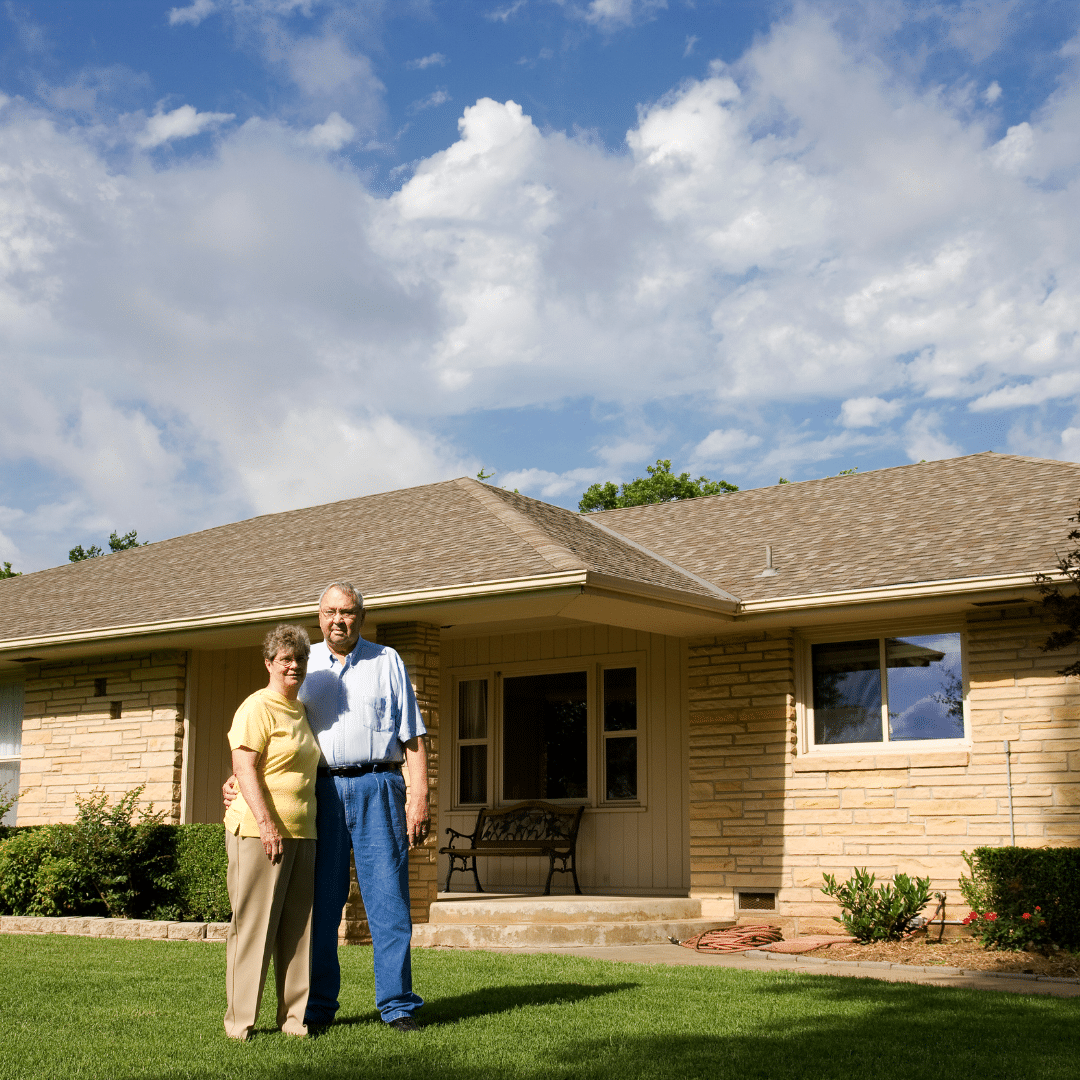 couple standing in front of milwaukee home