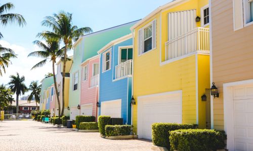 sunny-day-pastel-colored-apartments-houses-and-h-2023-11-27-04-57-53-utc